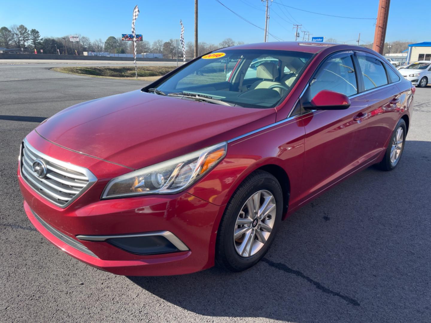 2016 Maroon Hyundai Sonata (5NPE24AF6GH) with an 4-Cyl, 2.4 Liter engine, Auto, 6-Spd w/Shiftronic and Drive Mode Select transmission, located at 8008 Warden Rd, Sherwood, AR, 72120, (501) 801-6100, 34.830078, -92.186684 - Photo#3